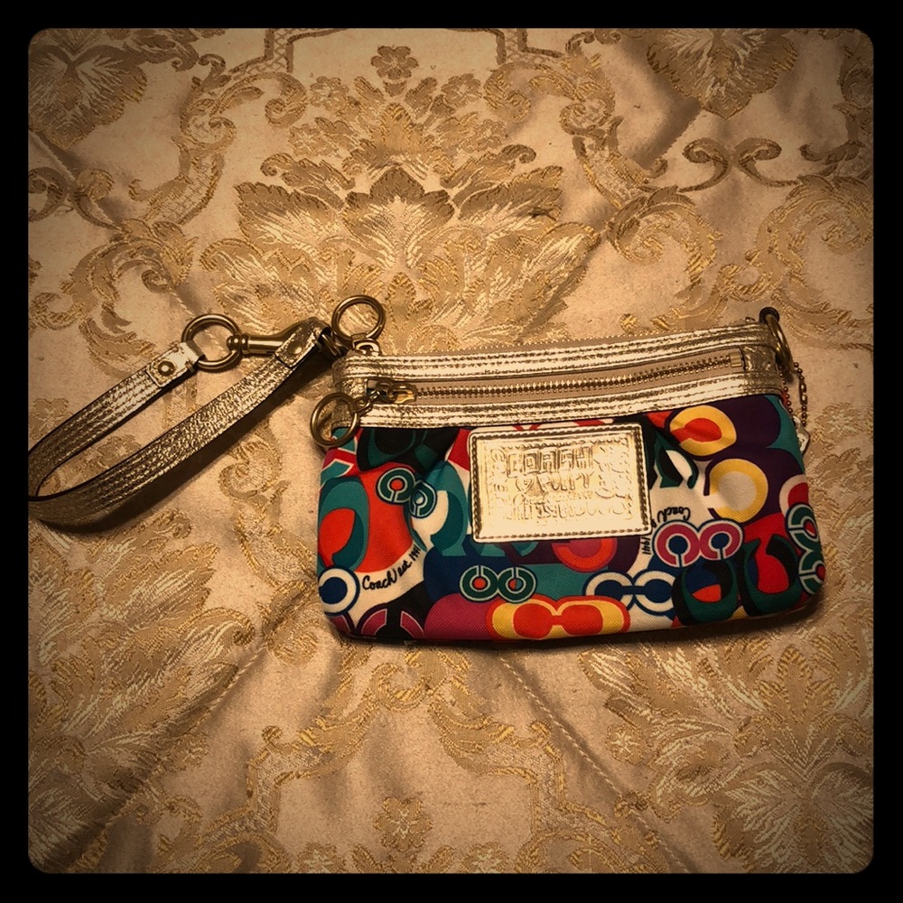 Colorful and flashy Coach wristlet